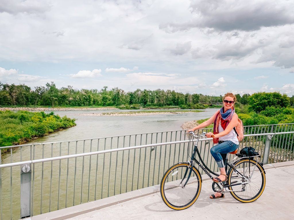 Riding a bike along the Bow River in Calgary