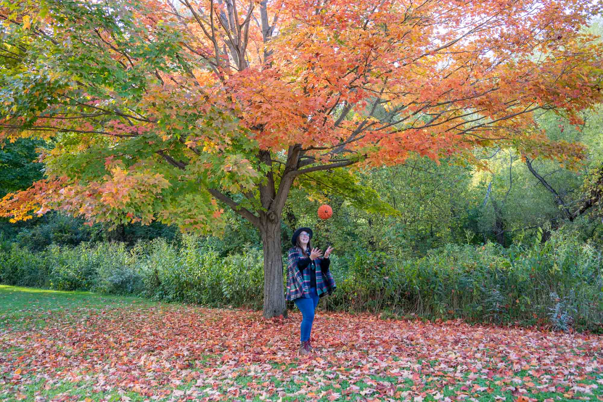 Amanda throwing a pumpkin