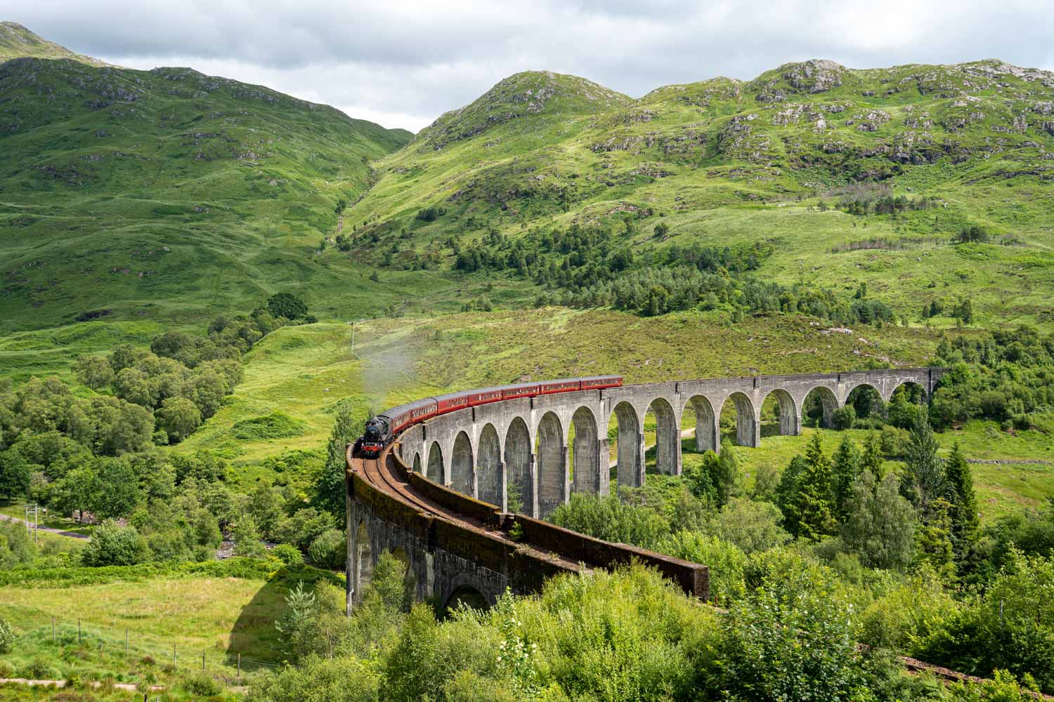 Jacobite steam train (Hogwarts Express) crossing the Glenfinnan Viaduct